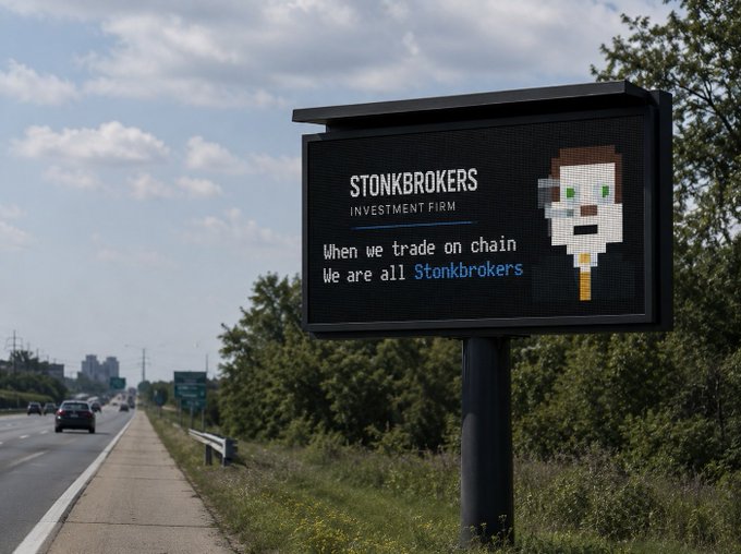 A roadside billboard reading 'STONKBROKERS INVESTMENT FIRM - When we trade on chain We are all Stonkbrokers' with a pixel art character, set along a highway.