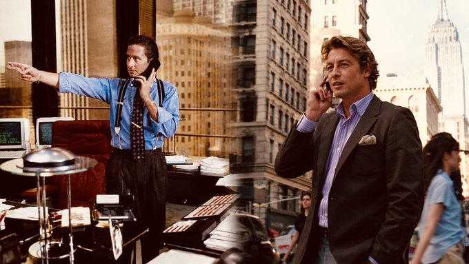 A split image shows Christian Bale in a blue shirt with a phone on the left, and Simon Baker in a suit with a phone on the right, both against a city backdrop.