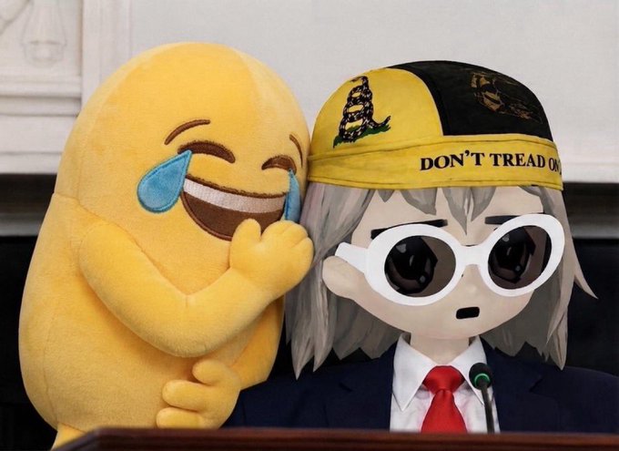 The image shows a crying-laughing emoji plushie next to an anime-style character wearing a Gadsden flag hat that reads "DON'T TREAD ON..." and large round sunglasses, dressed in a suit and red tie at a podium. The meme humorously comments on @a1lon9's (Alon Nine's) projects returning to Solana, using the character's deadpan, unimpressed expression paired with the laughing emoji to mock the situation.