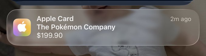 An iOS notification shows an Apple Card charge from "The Pokémon Company" for $199.90, posted 2 minutes ago. The celebratory caption "yaaaaaaaaaaaaaaaaaaaaaaaaaaaaaas" reflects the user's excitement about a big Pokémon purchase.