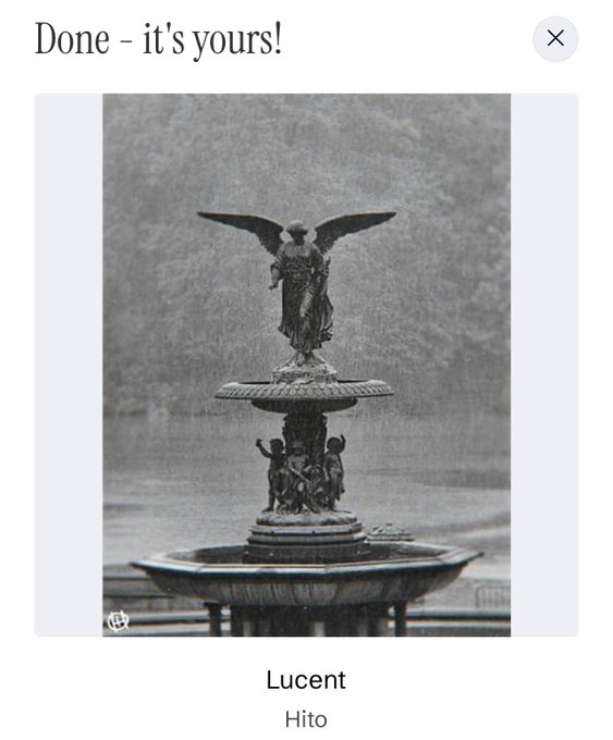 A black and white photograph of the Bethesda Fountain featuring an angel statue, labeled 'Done - it's yours!' with the name 'Lucent' and 'Hito' displayed below.