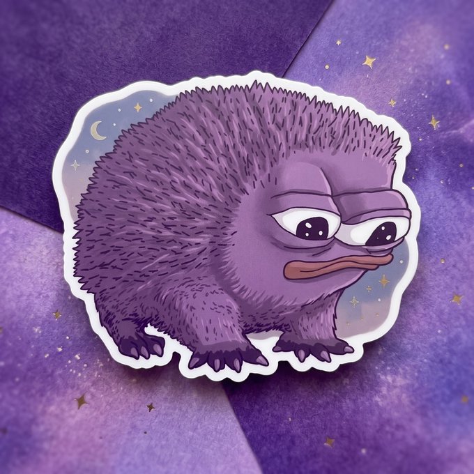 A cartoon sticker of a grumpy, fuzzy purple creature with large eyes against a starry background.