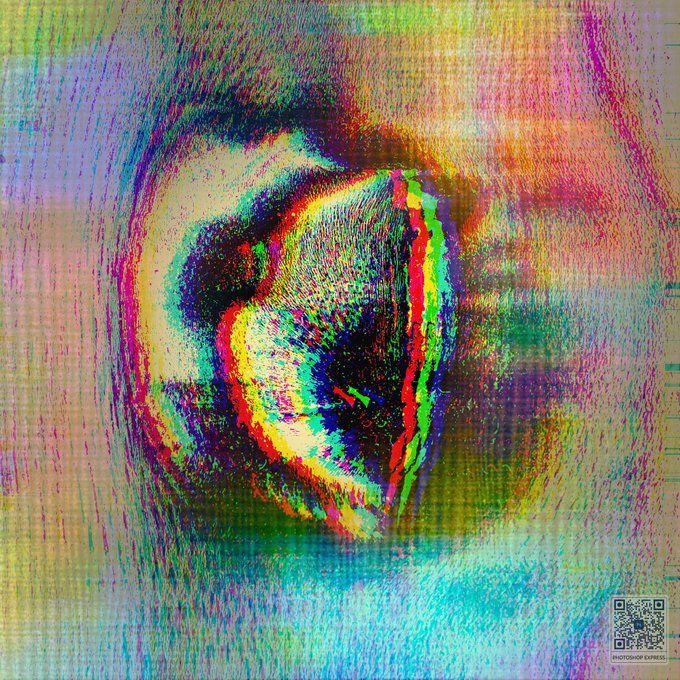 A vibrant, glitch-art style image features an abstract, multicolored form resembling a distorted eye or face, with heavy chromatic aberration and static textures. A small QR code in the bottom right corner is labeled "PHOTOSHOP EXPRESS," while the accompanying "Objkt" caption suggests this is an NFT artwork listing on the Objkt platform, where the piece's abstract, digital aesthetic aligns with the experimental digital art commonly minted there.