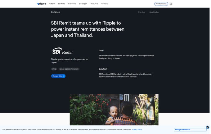 A Ripple case study page highlighting SBI Remit's partnership with Ripple to enable instant cross-border remittances between Japan and Thailand, with the company identified as the largest money transfer provider in Japan. The image visually supports the post by showcasing a real-world remittance recipient—an immigrant worker with her child—illustrating the human impact of the SBI Remit–Siam Commercial Bank corridor operating on RippleNet.
