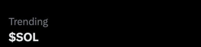 A dark-themed graphic displays the word "Trending" above the ticker "$SOL" in white text, highlighting Solana's status as a trending cryptocurrency. This visual pairs with the post questioning whether Solana's trending position is being driven by the influencer $ANSEM.