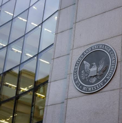 The image shows the official seal of the U.S. Securities and Exchange Commission (SEC) mounted on the exterior of a modern glass building. The post references "$STONK" and "$AI," tying into SEC matters, likely referencing the SEC's involvement in regulatory or enforcement actions related to AI-driven or meme-stock trading activity.