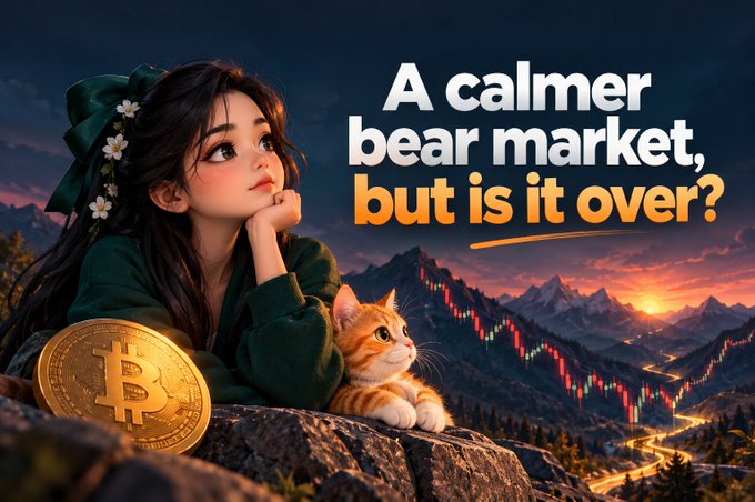A stylized digital illustration featuring a girl with a green bow alongside a Bitcoin coin and an orange cat, with the headline text 'A calmer bear market, but is it over?' displayed over a mountain landscape with a stock chart overlay.