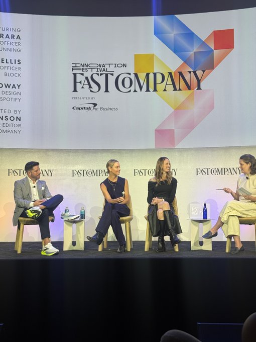 Four panelists sit on stage at the Fast Company Innovation Festival, presented by Capital One Business, with the "Fast Company" logo and colorful geometric design displayed on the backdrop behind them, including names like "Sara" and "Ellis" visible on the side panel. The image captures the "The New Rules of Design" panel mentioned in the post, showing the discussion taking place.