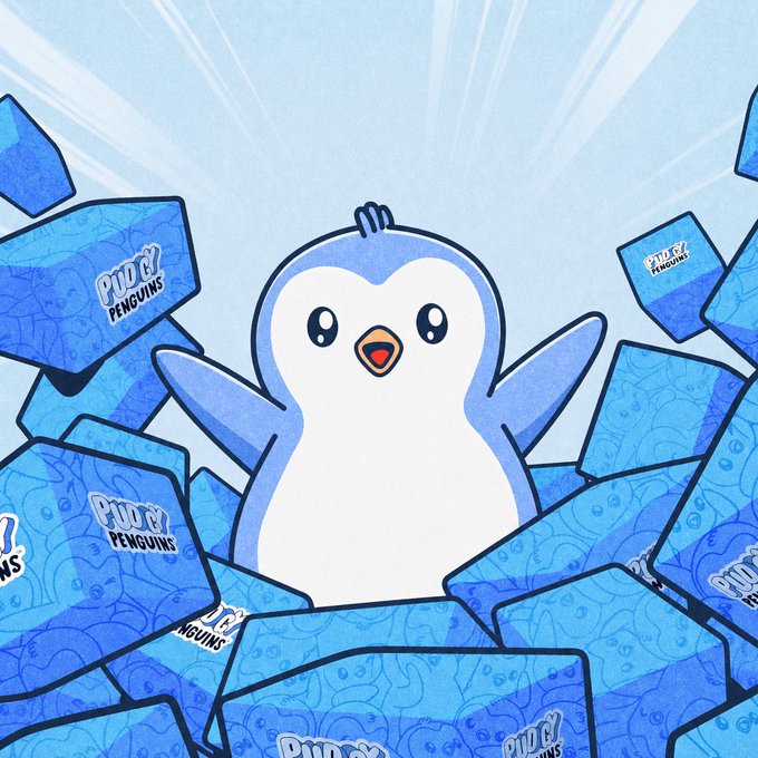 Illustration of a cute penguin character with outstretched arms emerging from a pile of blue boxes labeled 'Pudgy Penguins'.