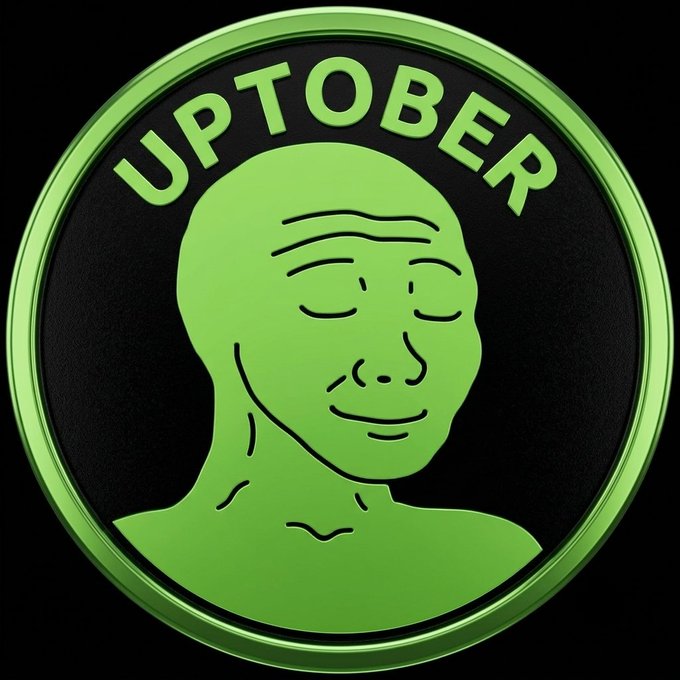 A green circular meme coin design featuring the Wojak 'smiling bald man' face with the word 'UPTOBER' arched across the top.