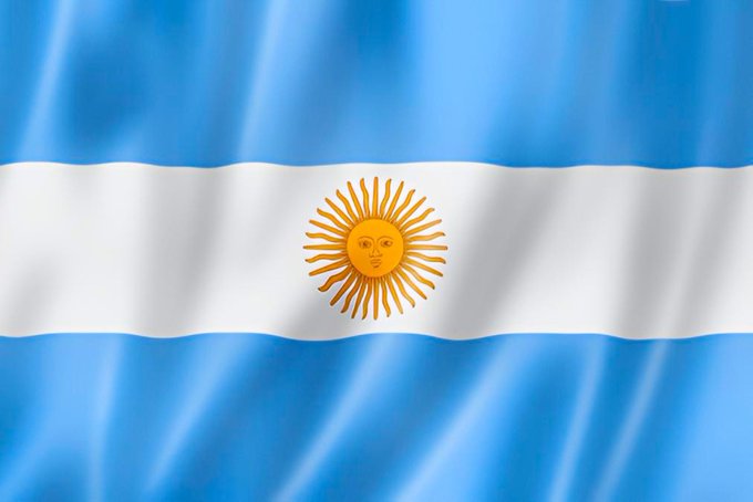 The image shows the flag of Argentina, featuring light blue and white horizontal stripes with the golden "Sun of May" emblem in the center. The flag's wavy, ruffled appearance suggests movement, but there's no text or specific numbers visible to connect it to the post's humorous tone.