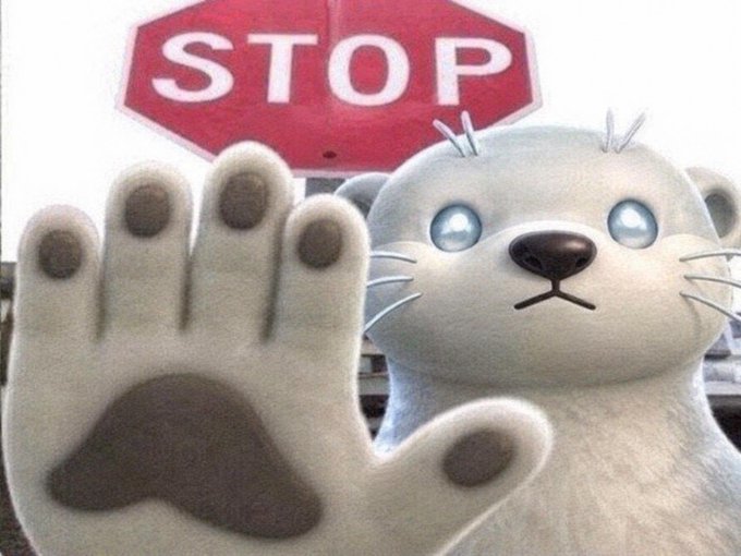 A polar bear holds up its paw with "STOP" written on the pad, standing in front of a stop sign, visually pleading for the negativity and FUD to halt around the upcoming TGE.