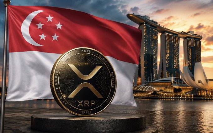 A golden XRP (Ripple) cryptocurrency coin displayed in front of the Singapore flag with the Marina Bay Sands hotel visible in the background at sunset.