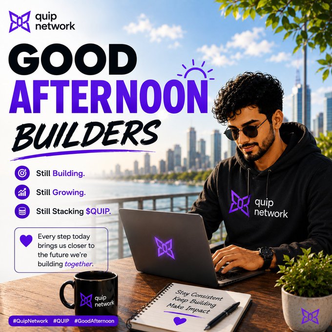A person wearing a "quip network" hoodie works on a laptop beside a branded coffee mug and notebook, with a city skyline in the background. The image features promotional text including "Good Afternoon Builders," "Still Building. Still Growing. Still Stacking $QUIP," and the hashtag "#QuipNetwork #QUIP #GoodAfternoon," visually reinforcing the post's message of productive growth and community building.