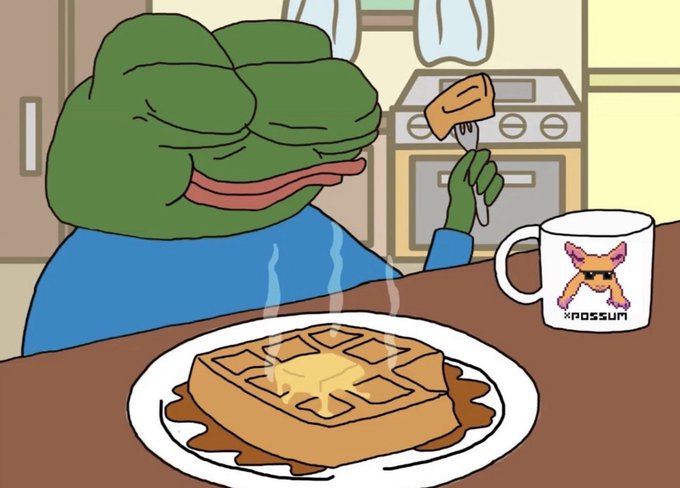 A cartoon illustration of Pepe the Frog sitting at a kitchen table eating waffles with butter and syrup, with a white mug beside the plate displaying a pixel art possum and the text 'xpossumm'.