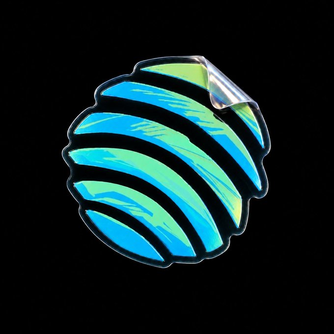 An illustration of a spherical object with curved cyan and lime green stripes, partially covered by a metallic silver piece at the top, set against a black background.