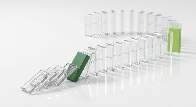 A row of clear domino blocks with two green ones set off from the rest, positioned on a reflective white surface, illustrates the concept of a chain reaction in motion. The image cleverly mirrors the post's message about the SEC's proposed crypto rules, suggesting that regulatory decisions could set off a "domino effect" with uncertain consequences for the future of digital asset investments.