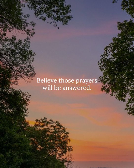 A serene sunset sky framed by tree silhouettes features the white text overlay reading, "Believe those prayers will be answered."