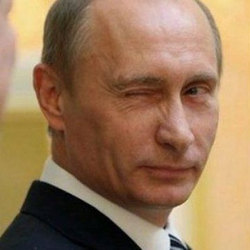 The image shows Vladimir Putin winking, seemingly in response to the news that Russia's Bank of Russia has approved Bitcoin, Ethereum, and Tether for public trading on domestic exchanges.