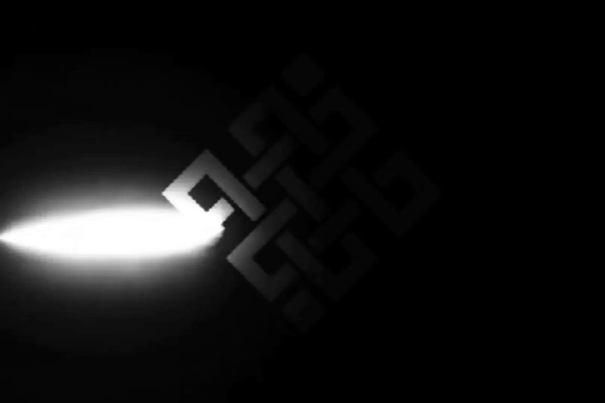 The image features an abstract design with a white diamond shape, which appears to be glowing or emitting light from the top left corner of the frame. This glowing element stands out against the black background, drawing attention to its presence. The caption provided after the image provides context about the main challenge in AI development for blockchain technology: building AI systems that can operate at the blockchain level and execute actions based on the model's output.
