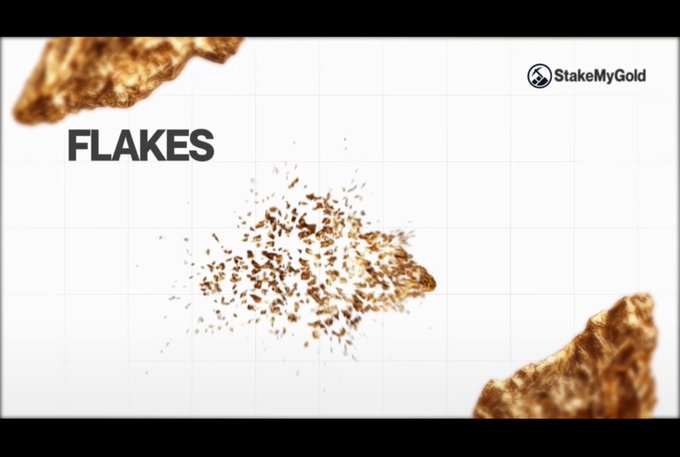 A promotional graphic for 'FLAKES' by StakeMyGold shows scattered gold flakes against a white background with grid lines, featuring the StakeMyGold logo in the upper right corner.