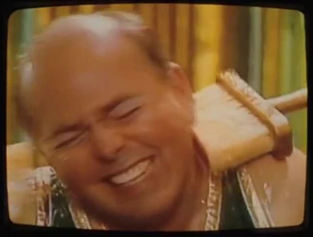 The image features a bald man with short hair, wearing a green shirt and having his head tilted back while smiling widely. The caption of the image states "get real sticky and get $HYPE for free hyperliquid only up $100 before  2007 or I'M STICKED". This phrase is most likely a description or advice related to the man in the image, as it implies that he is sticking around or getting involved with something.