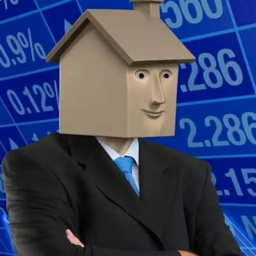 A surreal portrait shows a man in a dark suit and blue tie wearing a cardboard house on his head, standing with crossed arms in front of a blue background displaying financial numbers like '0.9%' and '2.286'.