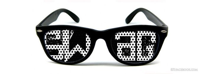 An identical pair of black novelty shutter shades sunglasses with perforated lenses spelling 'SHUT UP' in white text, branded with '851FACEBOOK.COM'.