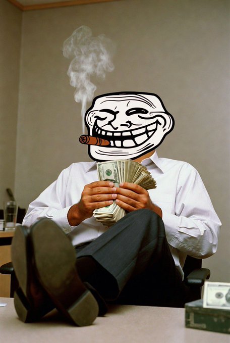 A troll face sticker over a person in a white shirt and black pants sitting in an office chair, holding a fan of cash while smoking a cigar.