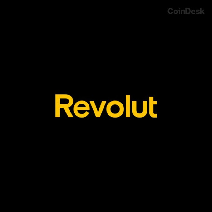 The word 'Revolut' appears in yellow text on a black background, with a 'CoinDesk' watermark in the top right corner.