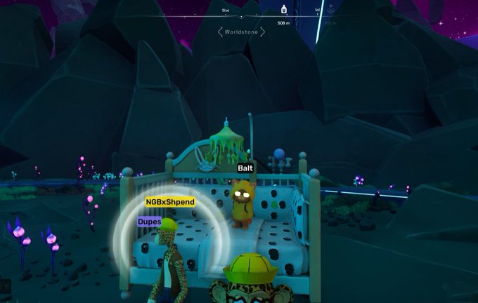 A character named "Balt" stands on a bed alongside "NGBxShpend" and "Dupes" at a virtual "Worldstone" event, set in a glowing, mountainous landscape 508m away, capturing the relaxed, social atmosphere the author enjoyed at the Quirkies NFT gathering.