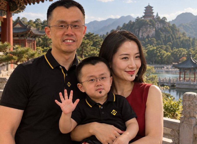 A family of three poses for a photo in front of traditional Chinese architecture with mountains in the background, featuring a father, mother, and young boy waving.
