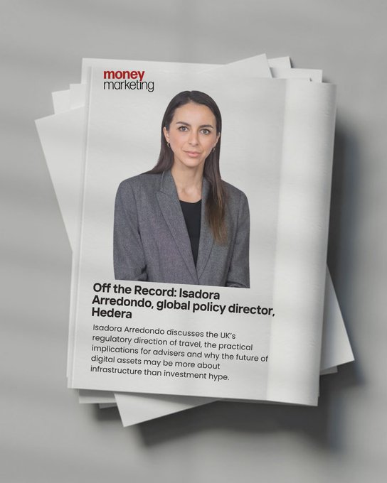 A stack of magazines featuring the "Money Marketing" cover highlights an interview with Isadora Arredondo, global policy director at Hedera, discussing the UK's regulatory direction for digital assets. The image ties to the post by visually showcasing the feature article about whether digital asset adoption is more about infrastructure modernization than investment hype.