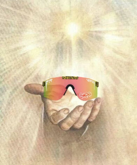 A pair of rainbow-reflective sunglasses labeled "VPM" and "SMOG" rests in an open, outstretched hand, glowing with a brilliant sunburst behind it, evoking the disorienting, blinding sensation of struggling to make sense of confusing small print or fine lines of text.