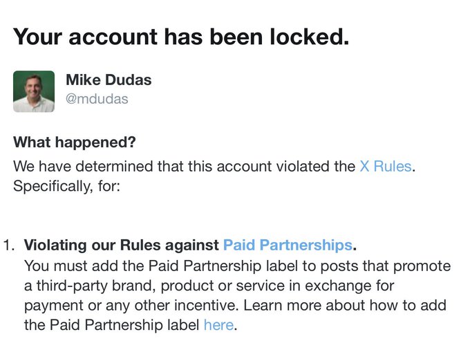 The image shows an account suspension notice from X stating that Mike Dudas' (@mdudas) account was locked for violating rules against Paid Partnerships by failing to label a post promoting a third-party brand. The accompanying post highlights the irony that after investing $2 million in pump.fun and launching the $MDUDAS token to drive trading volume, X penalized him for not adding a paid partnership disclosure on his investment promotion post.