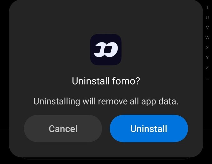 An Android uninstall confirmation dialog for the 'fomo' app, warning that uninstalling will remove all app data, with Cancel and Uninstall buttons.