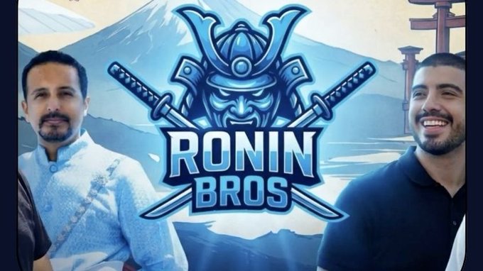 The image features two men wearing blue shirts with a sword design on them. They are standing next to each other against a backdrop of mountains and a castle. The text "RONIN BROS" is displayed above the men, indicating that they are part of an organization called Ronin Bros. Additionally, there is a caption below the image that reads "Attention @Ronin_Network family! The next RONIN BROS Episode is near. Tomorrow we're joined by @0xRoosta from the Sky Mavis team for a deep dive into the future of Ronin and web3 gaming".