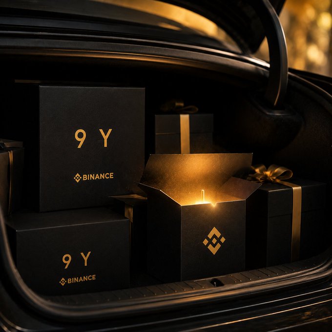 Black boxes marked "9Y" and "BINANCE" are arranged in a car trunk, with one open box revealing a glowing green candle inside, fitting the post's mystery drop challenge.
