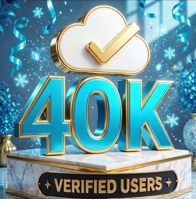 A celebratory graphic with a cloud checkmark above large blue and gold '40K' text, sitting on a marble pedestal labeled 'VERIFIED USERS', decorated with snowflakes and ribbons.