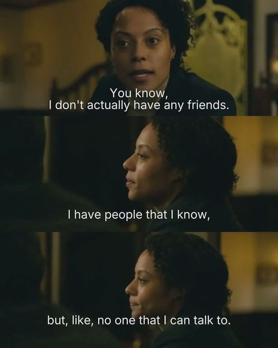 A woman with curly hair shares a vulnerable reflection in a dimly lit room, with subtitles reading: "You know, I don't actually have any friends. I have people that I know, but, like, no one that I can talk to."