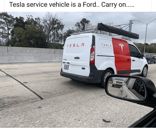 A white Tesla service van with red accents and "TESLA MOBILE SERVICE" branding is shown on a highway with a roof rack; the caption reads "Tesla service vehicle is a Ford.. Carry on....."