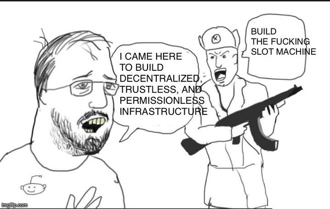 A black and white meme image features a drawn Charles Hoskinson saying "I CAME HERE TO BUILD DECENTRALIZED, TRUSTLESS, AND PERMISSIONLESS INFRASTRUCTURE," while an angry NPC character yells, "BUILD THE FUCKING SLOT MACHINE."