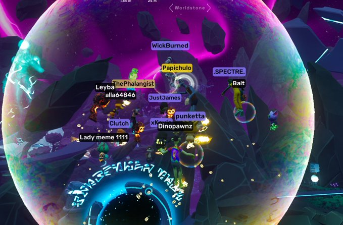 A vibrant screenshot from a video game (appearing to be Crab Game) shows multiple players with names like 'WickBurned', 'Papichulo', 'SPECTRE.', and 'JustJames' gathered around a glowing portal in a cosmic purple environment.