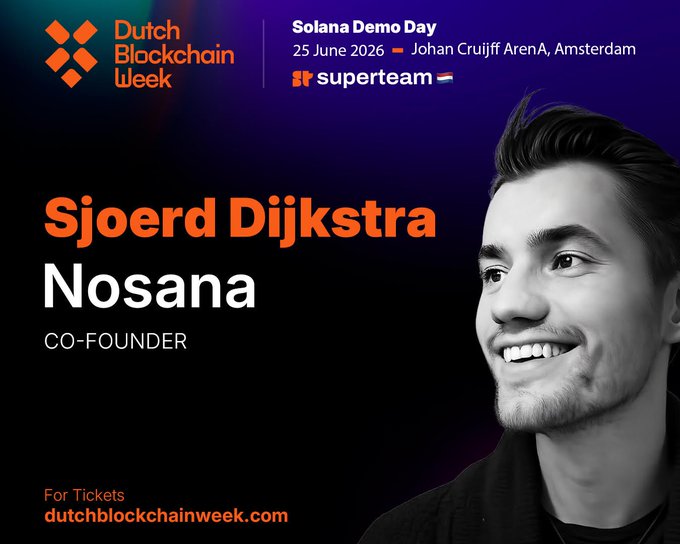 The image features a man with a beard, wearing a black shirt, smiling for the camera while standing against a dark background. The text "DutchBlockWeek" is written at the top of the image, indicating that this is an advertisement or promotional material related to the Dutch Blockchain Week event. The main focus of the image is on the man's face and his smile, which suggests that he might be a guest speaker or a participant in the event.