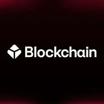 The image displays the Blockchain.com logo—a white geometric cube icon next to the word "Blockchain"—set against a dark maroon gradient background. It visually reinforces the post's announcement of Blockchain.com partnering with the NYSE to bring tokenized U.S. stocks and ETFs to crypto investors.