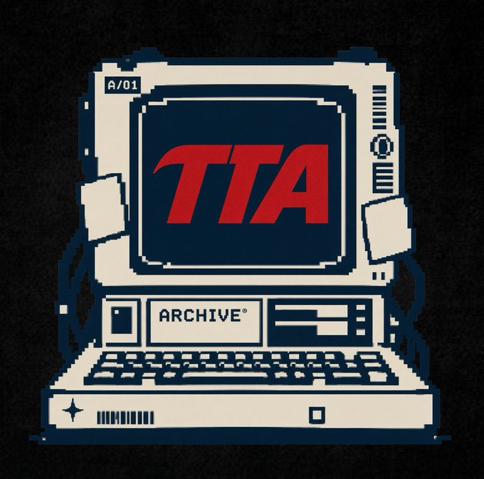 A pixel-art style illustration of a retro beige computer displaying the red letters "TTA" on its screen, with "A/01" and "ARCHIVE®" labeled on the device.