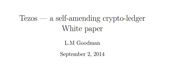 The image shows the title page of the original Tezos whitepaper, dated September 2, 2014, authored by L.M. Goodman, with the title reading "Tezos — a self-amending crypto-ledger White paper." This relates to the post by highlighting the foundational document and its author as timeless references to the core principles guiding the Tezos protocol.