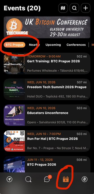The image shows a cell phone screen displaying an event page for Bitcoin Prague, which is scheduled for July 10th at 2:30 pm. The event appears to be a conference or gathering related to Bitcoin technology. There are several other events listed on the same page, including one in Prague and another in Slovakia. The text "Club Orange" can also be seen, possibly indicating that this event is taking place within an online community or club dedicated to Bitcoin enthusiasts.