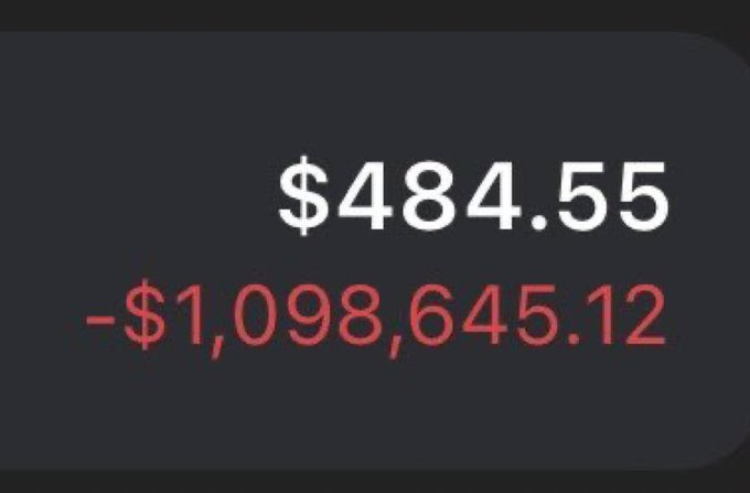 The image shows a stark financial summary displaying two figures: a positive **$484.55** in white above a much larger negative **-$1,098,645.12** in red, on a dark background. The dramatic swing of over a million dollars in losses visually represents the devastating impact described in the post, where the user laments losing money on "$laptop" and "hikes"—expressing hopelessness with "goodbye."