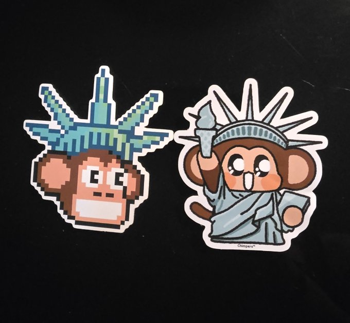 Two stickers featuring pixel-art monkey characters styled after New York City landmarks, including one dressed as the Statue of Liberty.